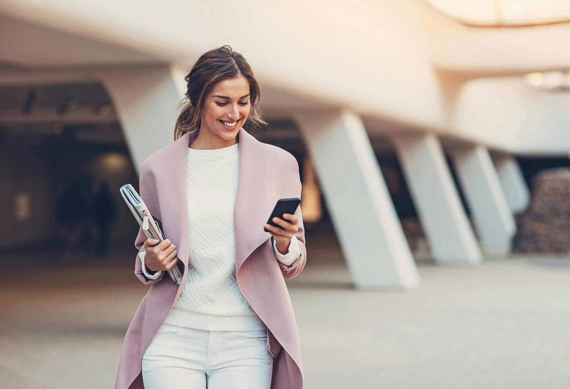 woman walking on phone