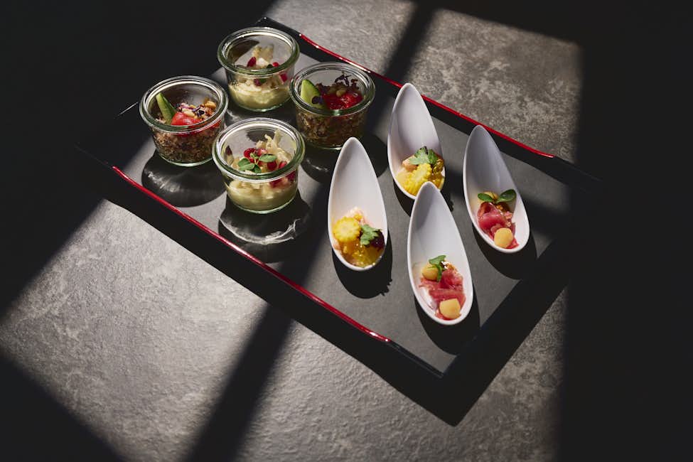 Apéro Appetizers served on a black tray in the KKL Luzern