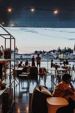 Summer Lounge on the Lucerne Terrace of the KKL Lucerne with a view of the City and the Lake