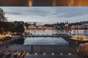 The Lucerne Terrace at the KKL Lucerne with a view of Lucerne in the evening