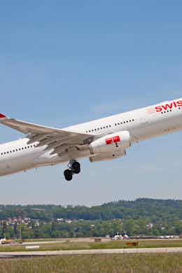 A Swiss Aircraft takes off at Zurich Airport.
