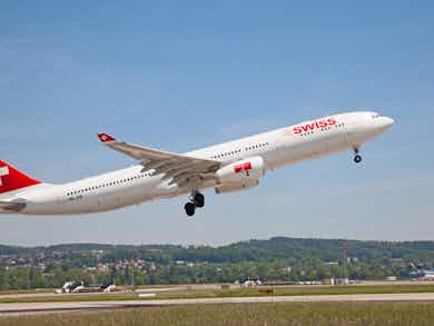 A Swiss Aircraft takes off at Zurich Airport.