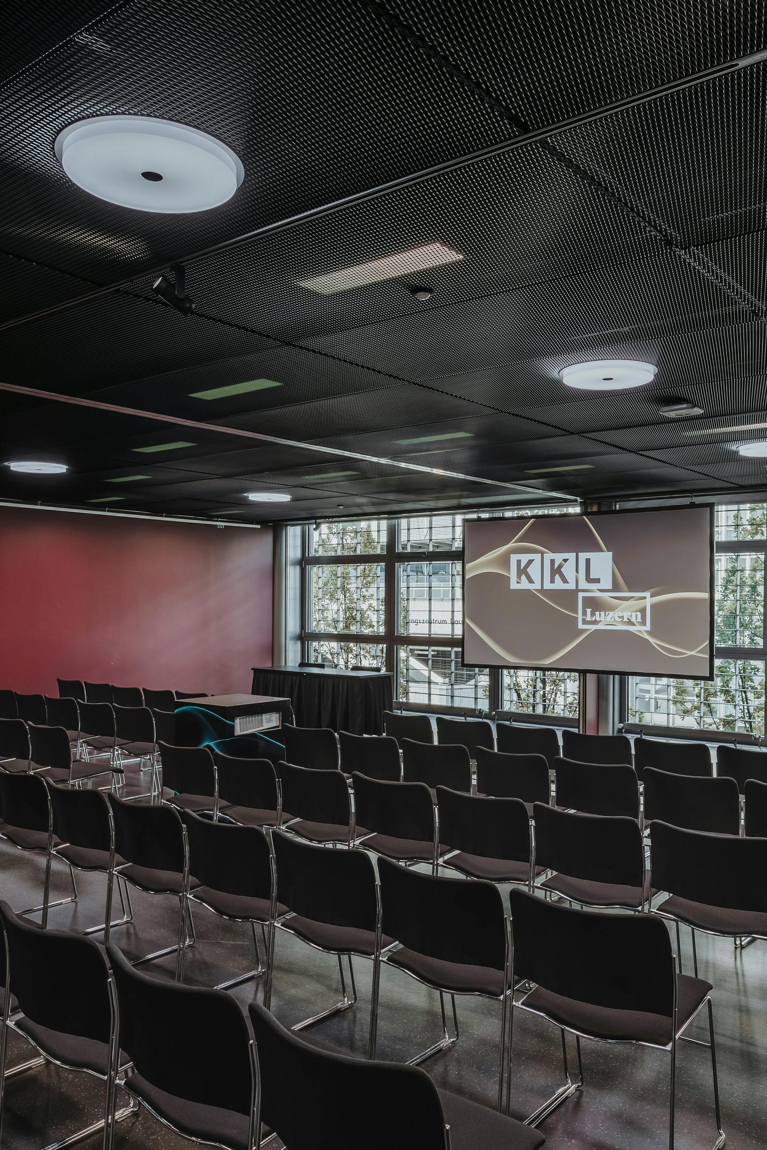 Row seating Clubrooms in KKL Luzern with LED Screen