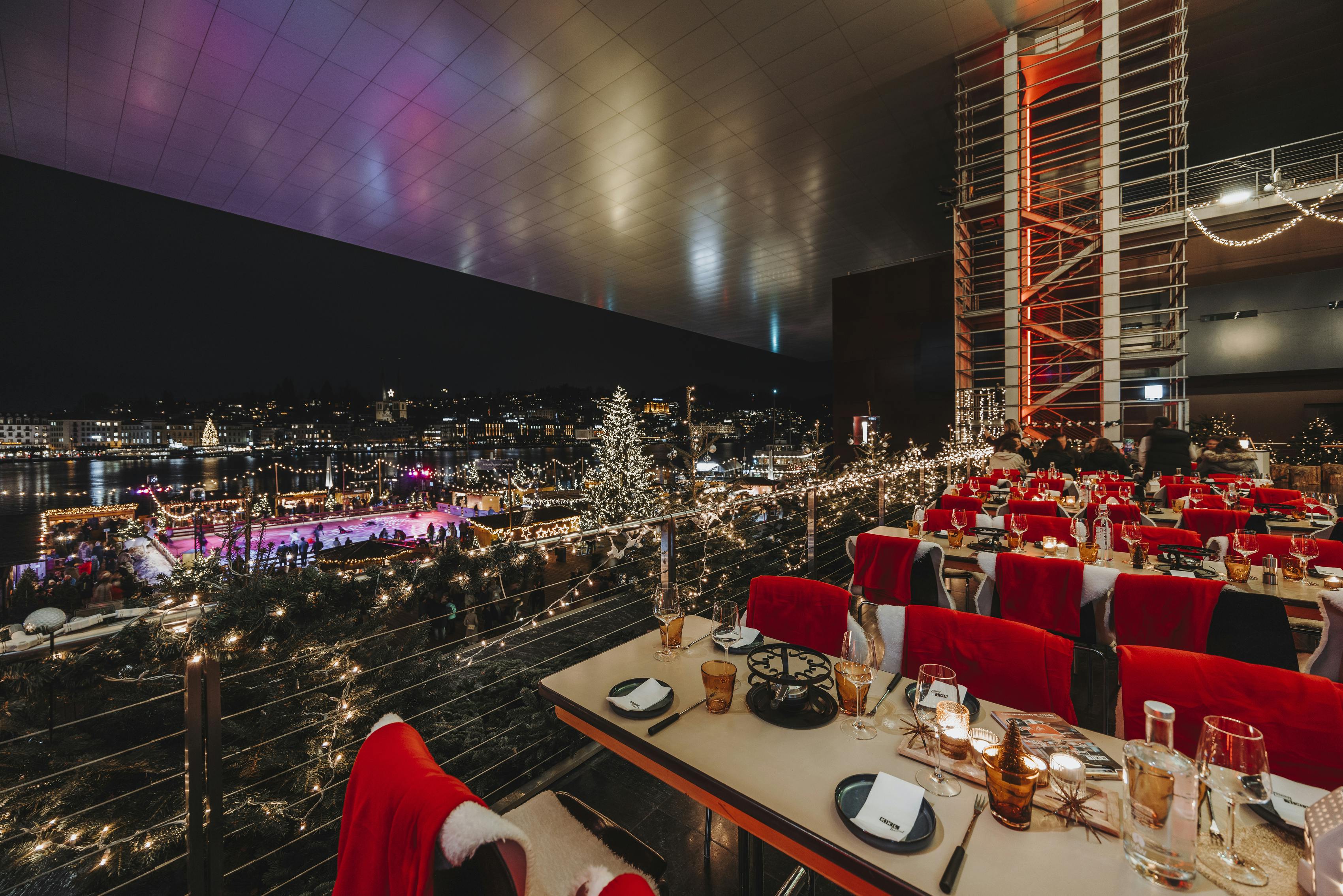 Winter Wonderland at the KKL Luzern with a view over the ice rink and the city of Lucerne