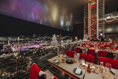 Winter Wonderland at the KKL Luzern with a view over the ice rink and the city of Lucerne