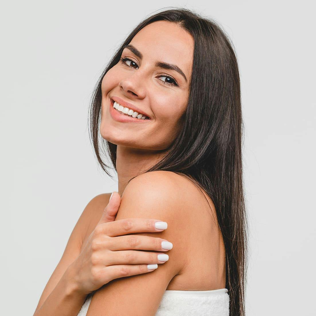 woman with brown hair smiling