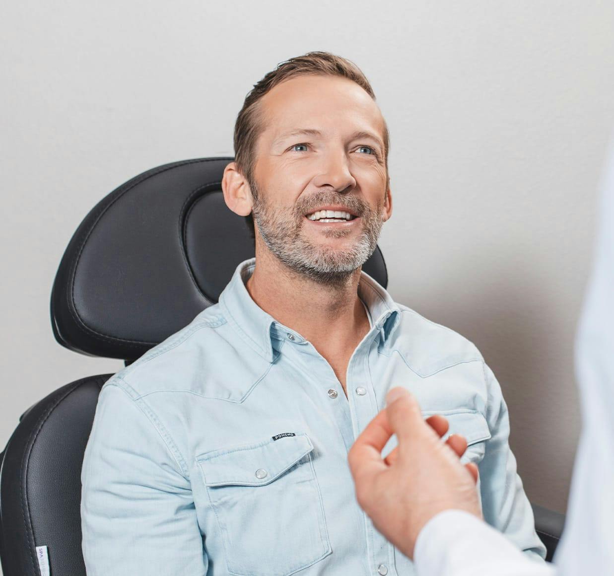 patient sitting in a chair