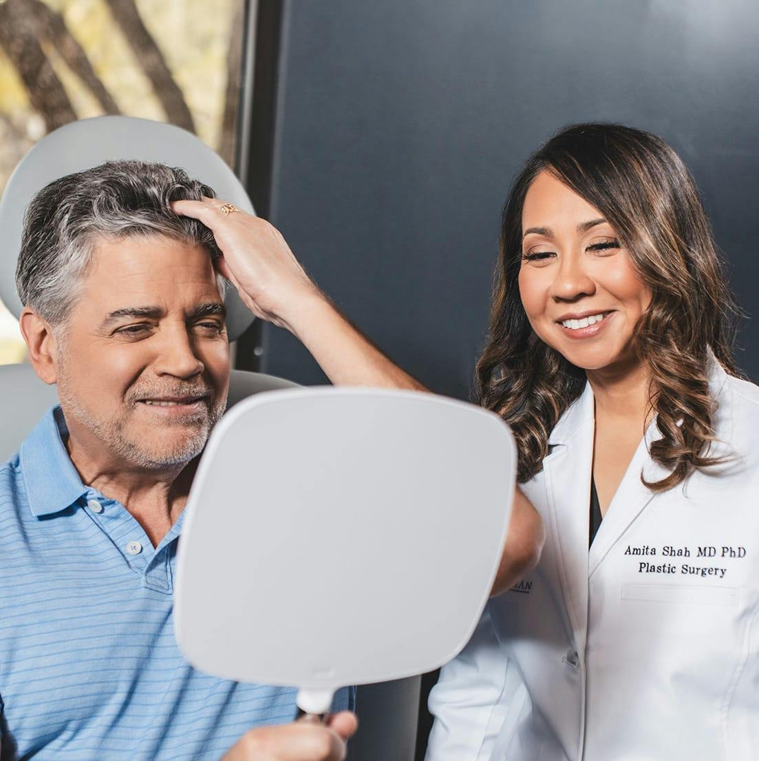 Dr. Shah with a patient