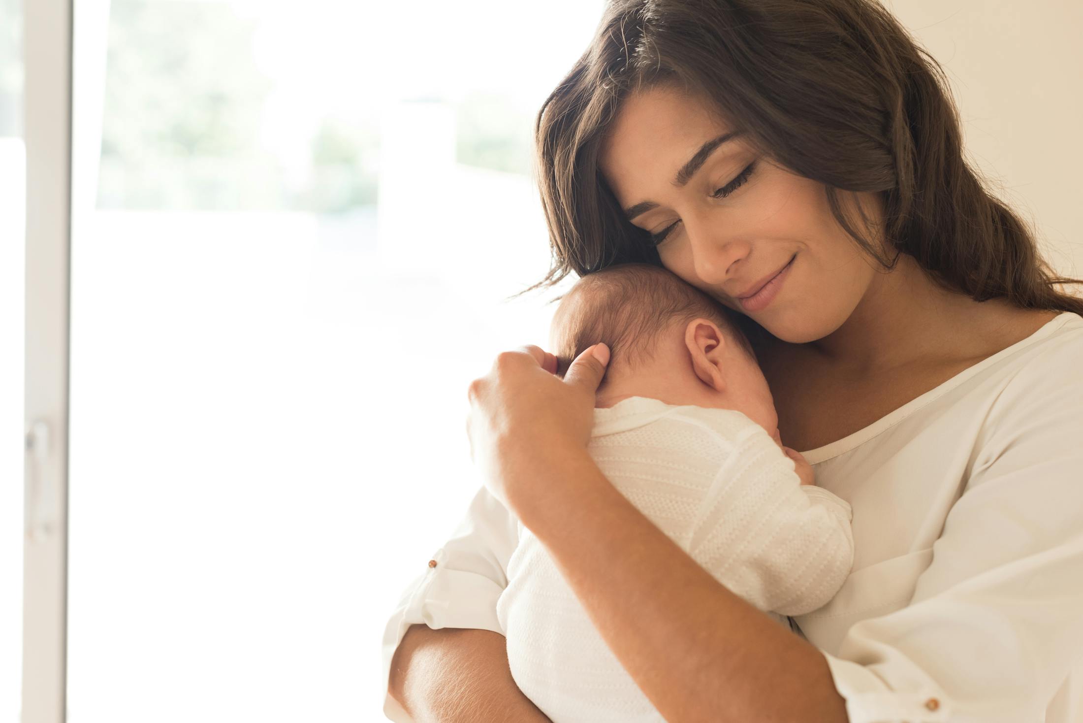 Woman Holding her Baby