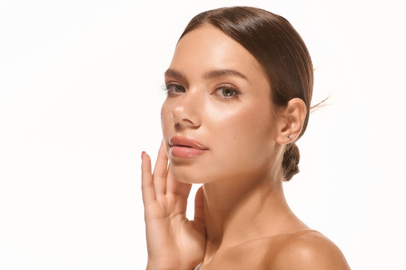 woman with glowy skin and face