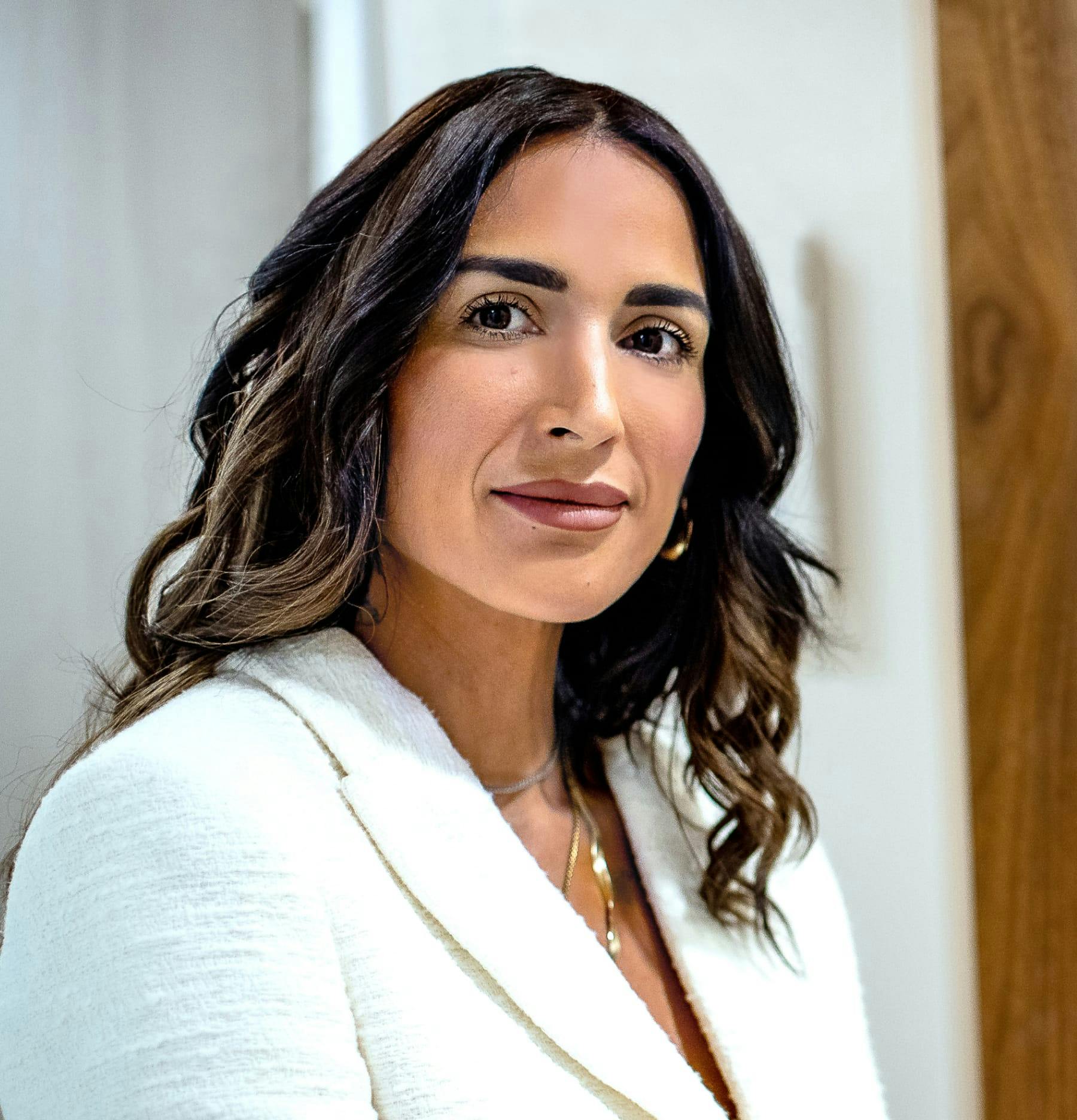 Woman in a white blazer