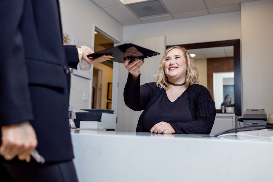 Woman at the Front Desk