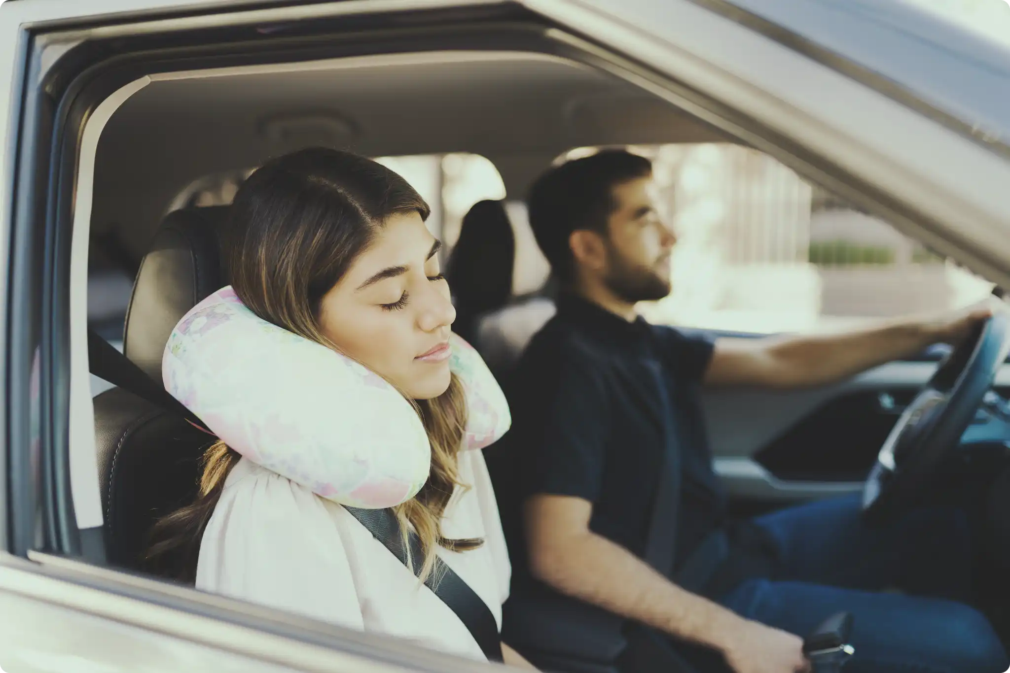 Woman and man in a car.