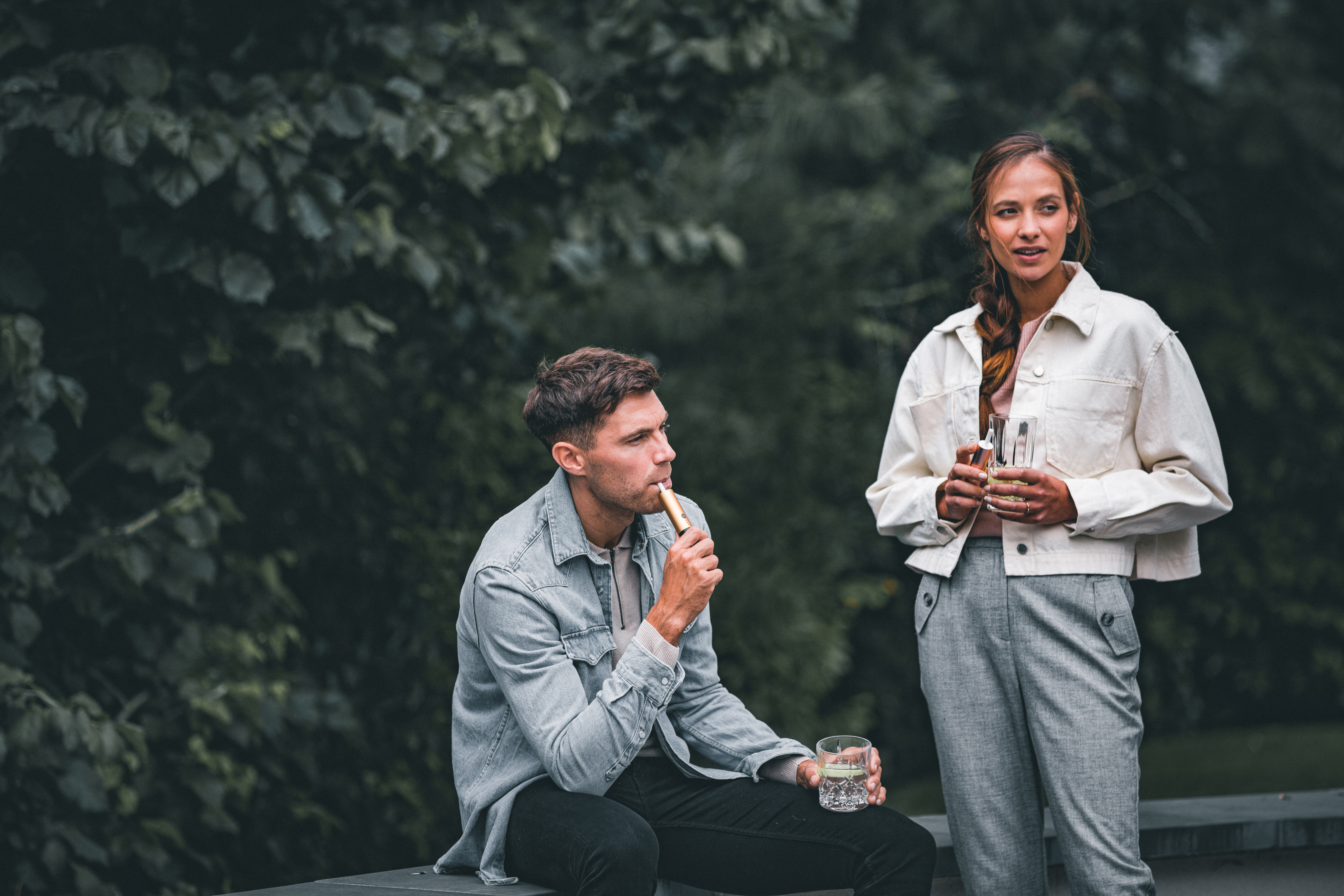 Medical cannabis treatment with cannabis oil and flower on a wooden table