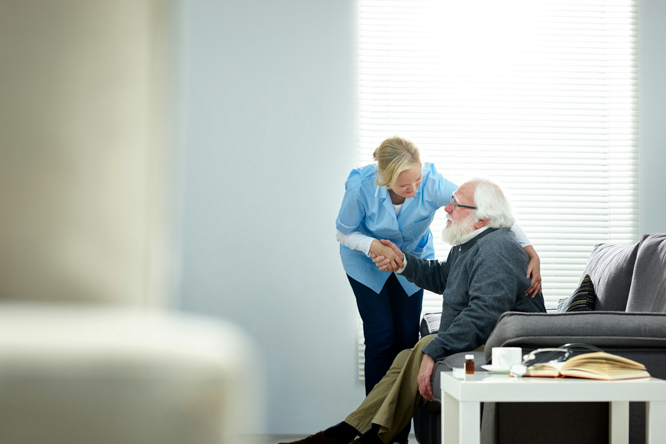Senior patient receiving medical cannabis treatment in care home