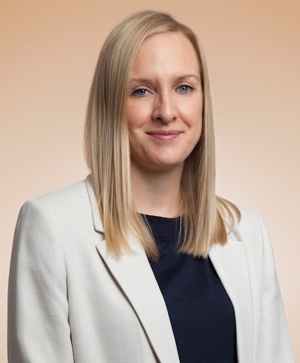 Medical cannabis treatment - a close-up of a professional preparing medical cannabis for patient care