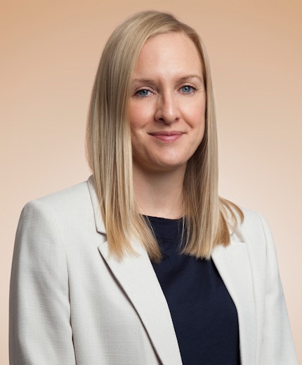 Medical cannabis treatment - a close-up of a professional preparing medical cannabis for patient care