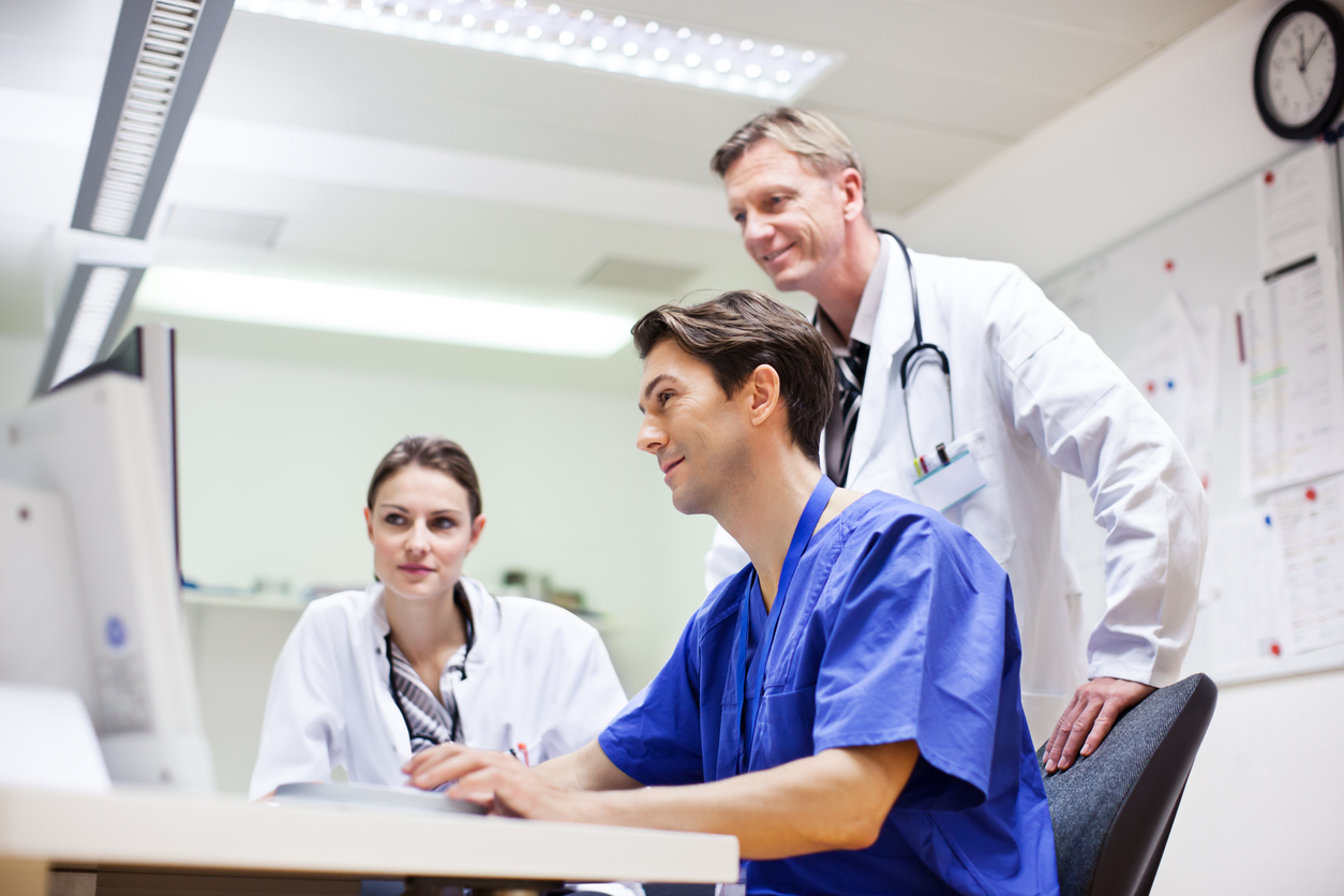 Doctor and support staff