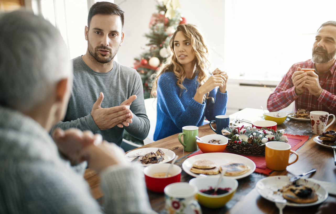 Family Discussion on Christmas Table