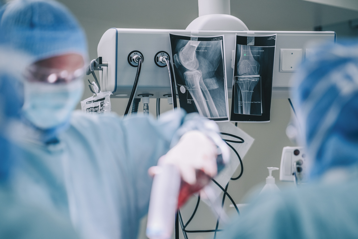 UK Surgeons Completing Surgery