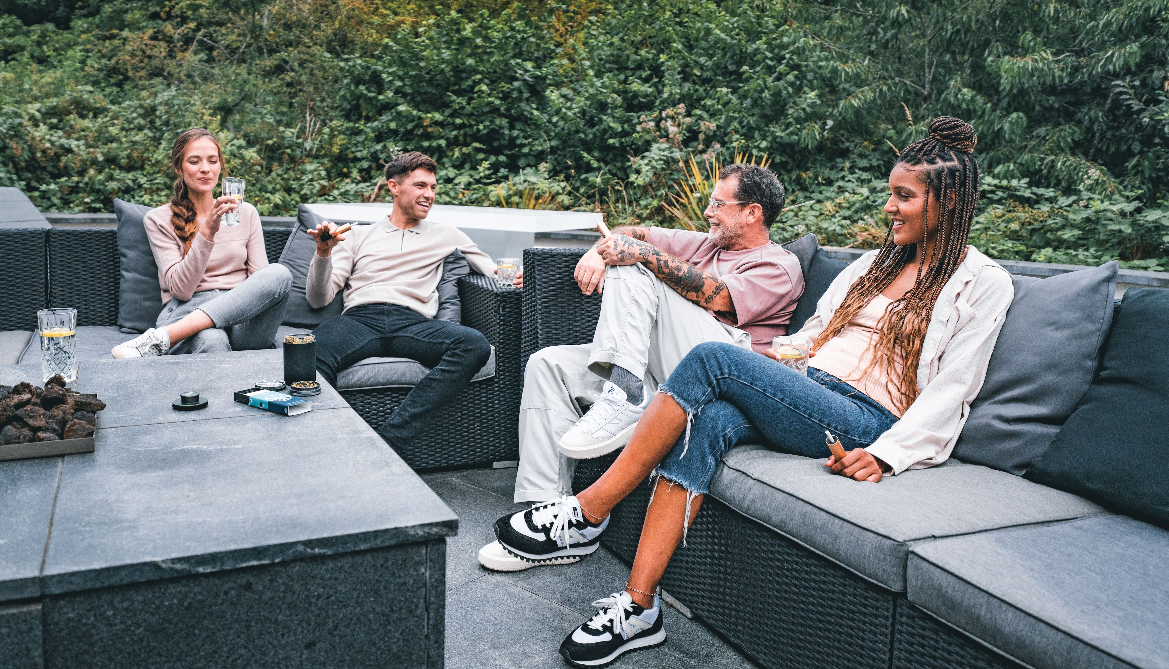 Medical cannabis treatment products arranged on a table including cannabis oil, capsules, and dried flower
