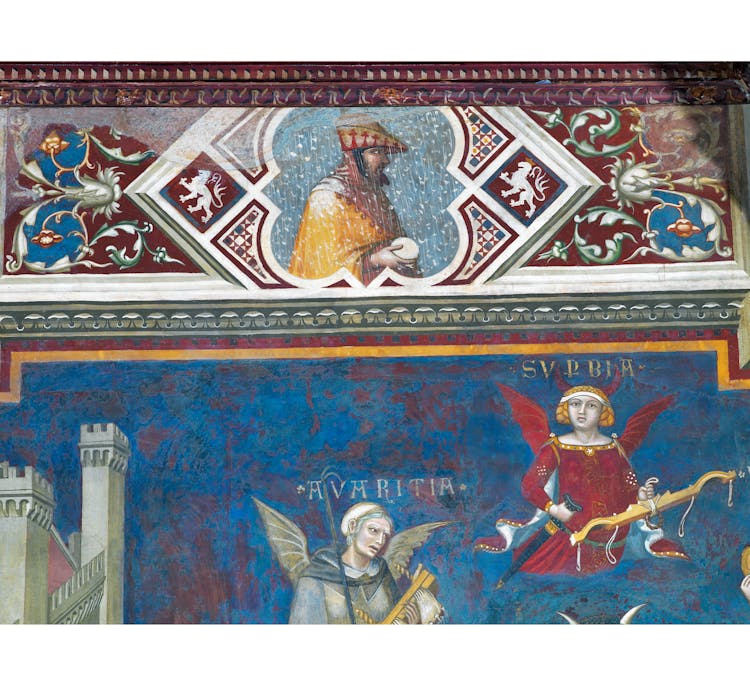 Particolare dell'affresco "Allegoria del Cattivo Governo" nella sala della Pace al Museo Civico di Siena