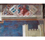 Particolare dell'affresco "Allegoria del Cattivo Governo" nella sala della Pace al Museo Civico di Siena