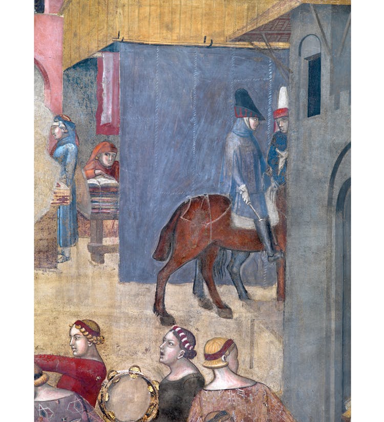 Particolare dell'affresco "Effetti del Buon Governo in città" nella sala della Pace al Museo Civico di Siena