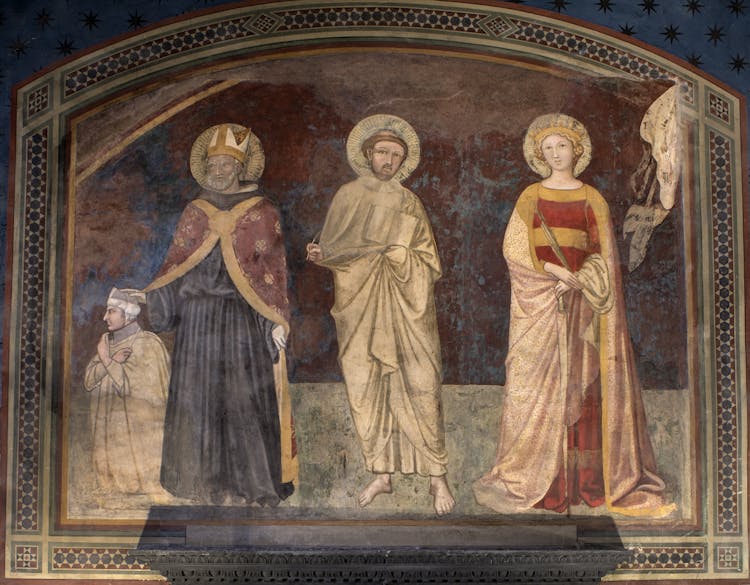 Affresco "Un Podestà e tre santi" di Ambrogio Lorenzetti presente nell'anticamera del concistoro nel Museo Civico di Siena.