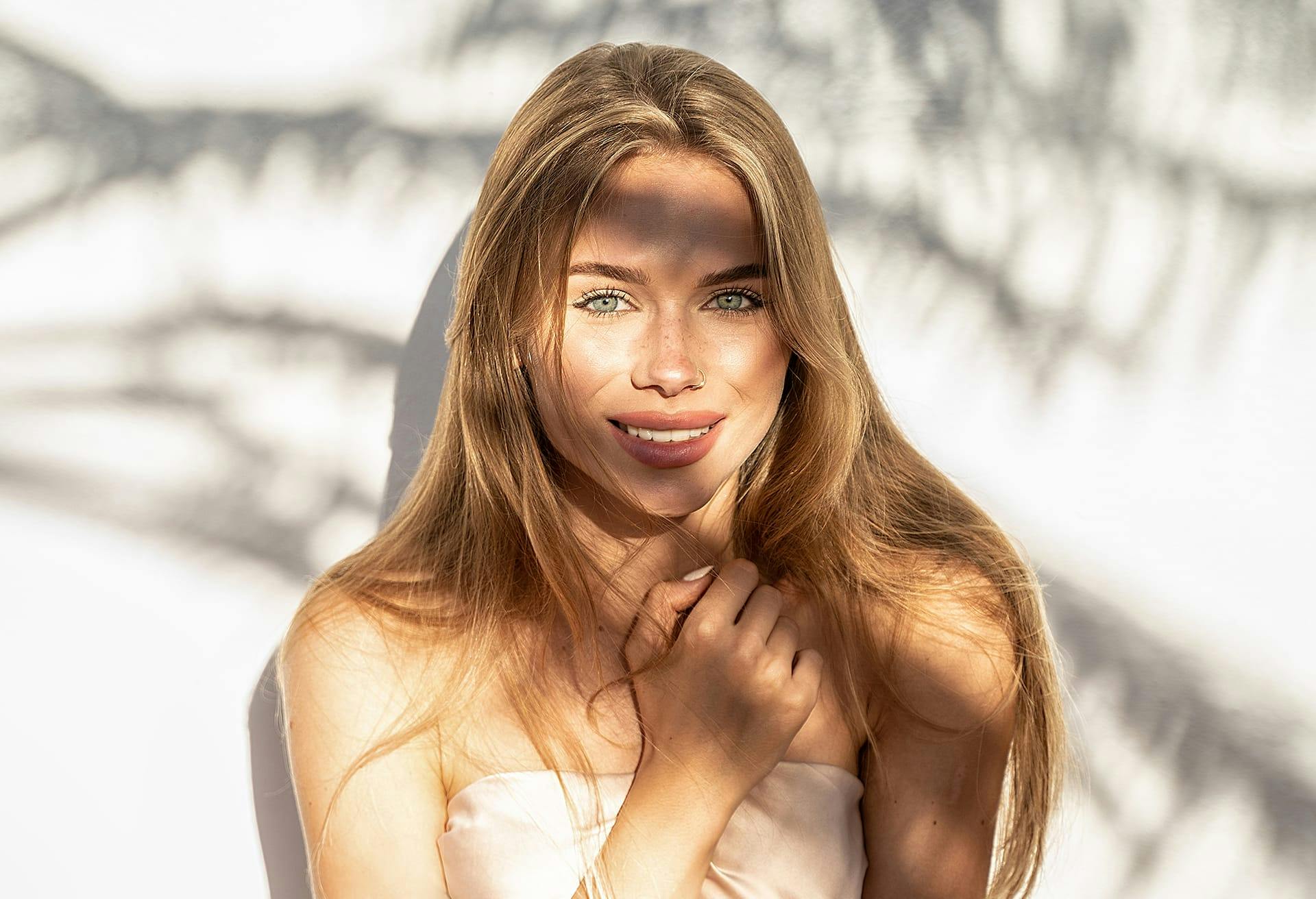 Woman Posing Against a Wall