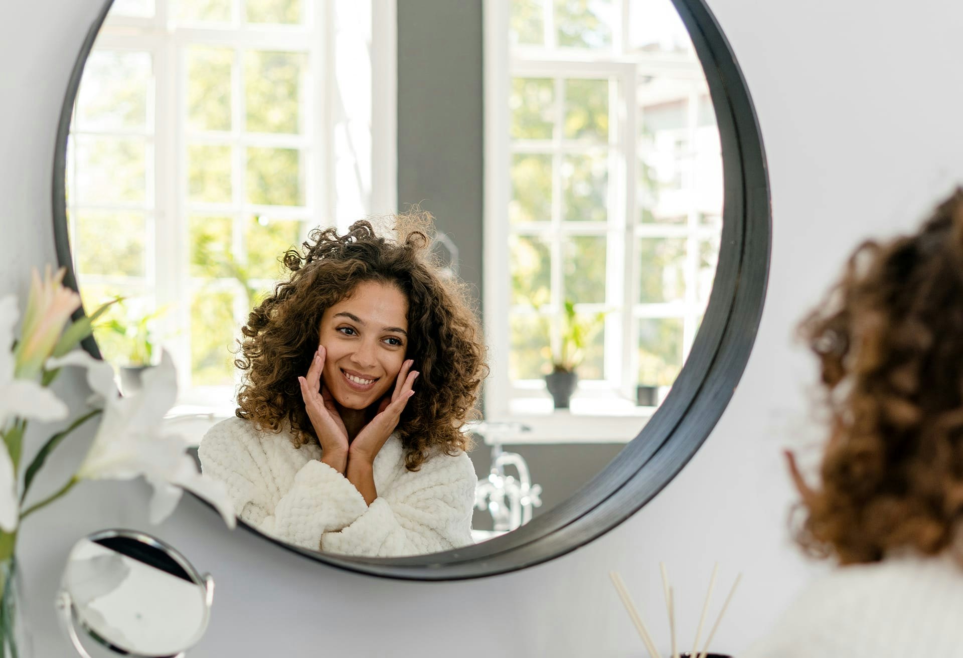 Woman Looking at Her Reflection
