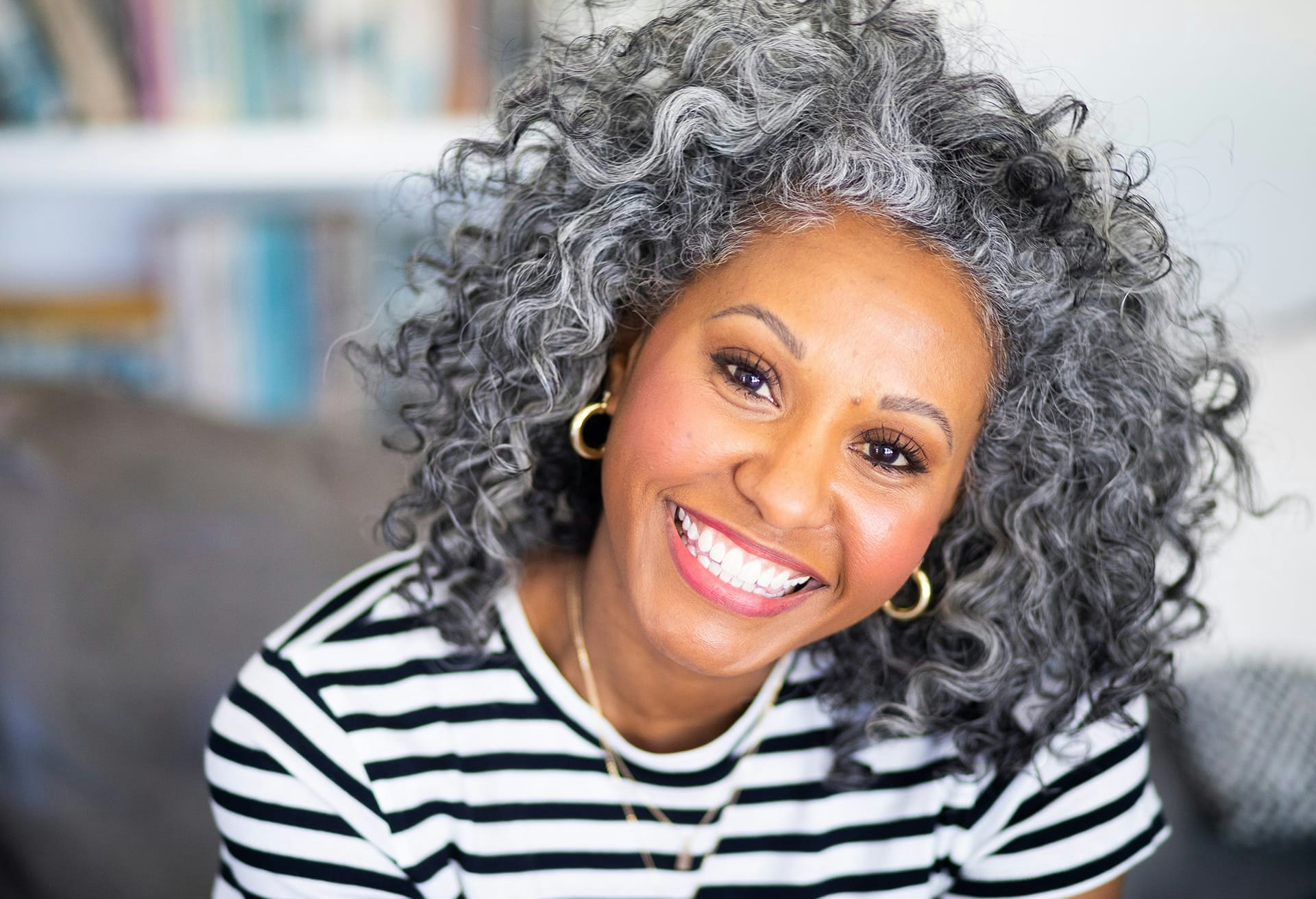 Woman with a Big Smile and Grey Hair