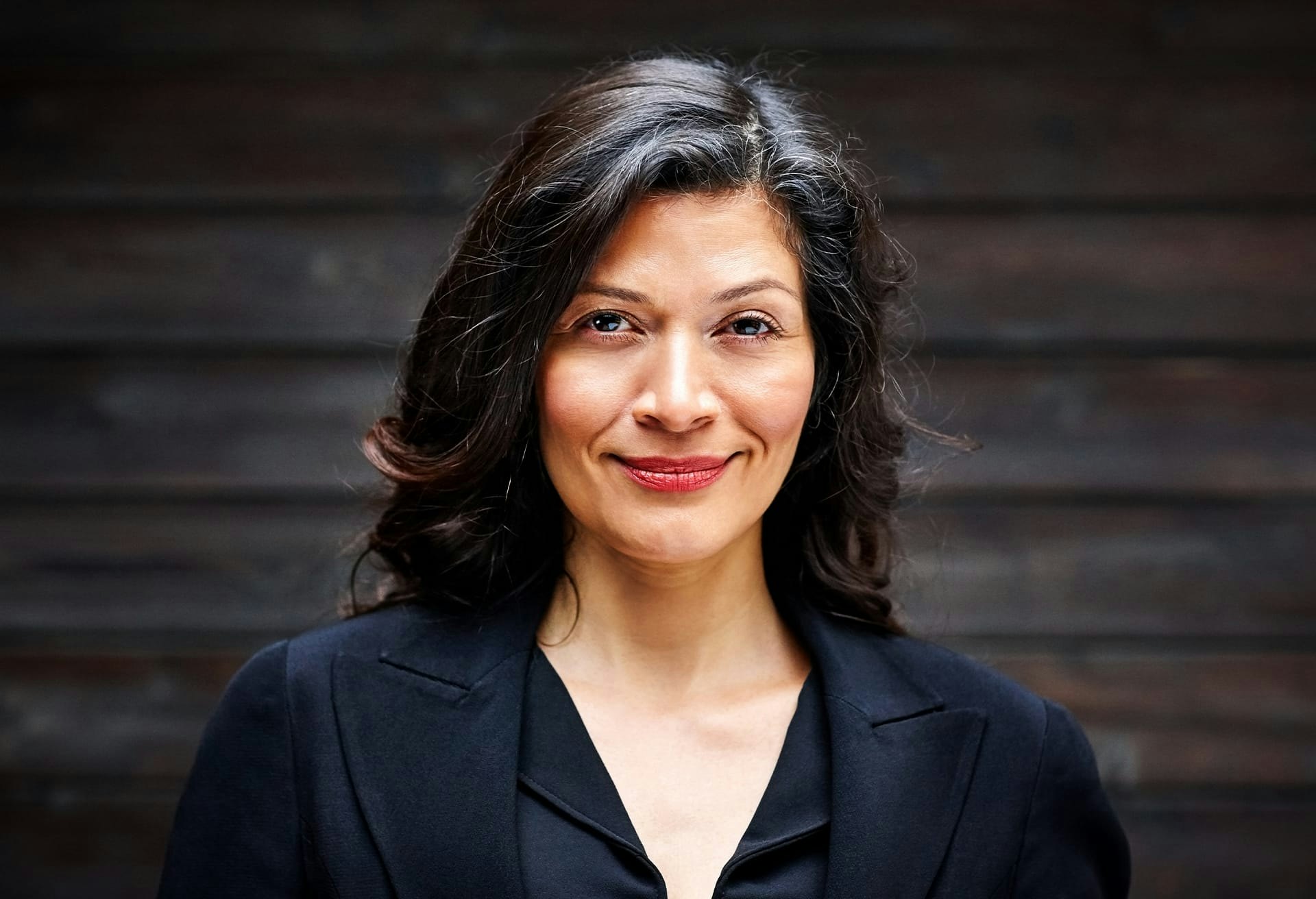 Woman with Dark Hair and Red Lipstick