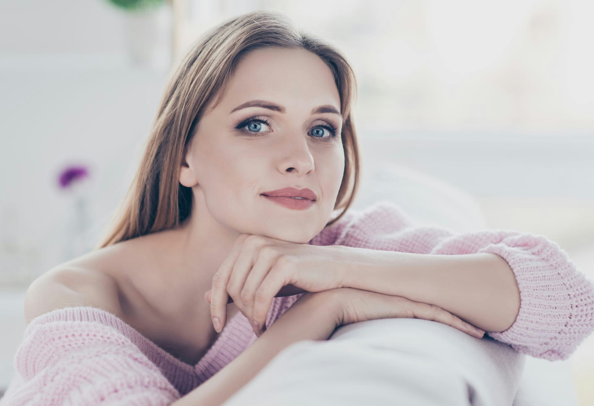 Woman Leaning on a Couch