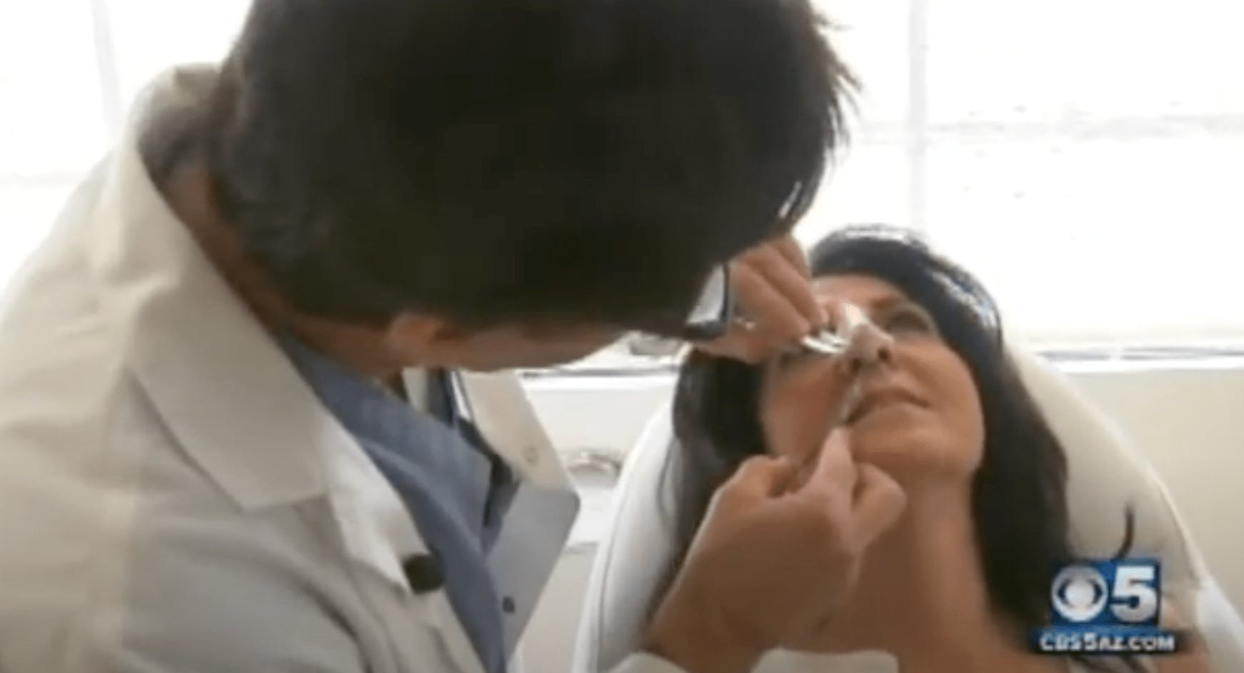 Dr. Shapiro Working on a Patient