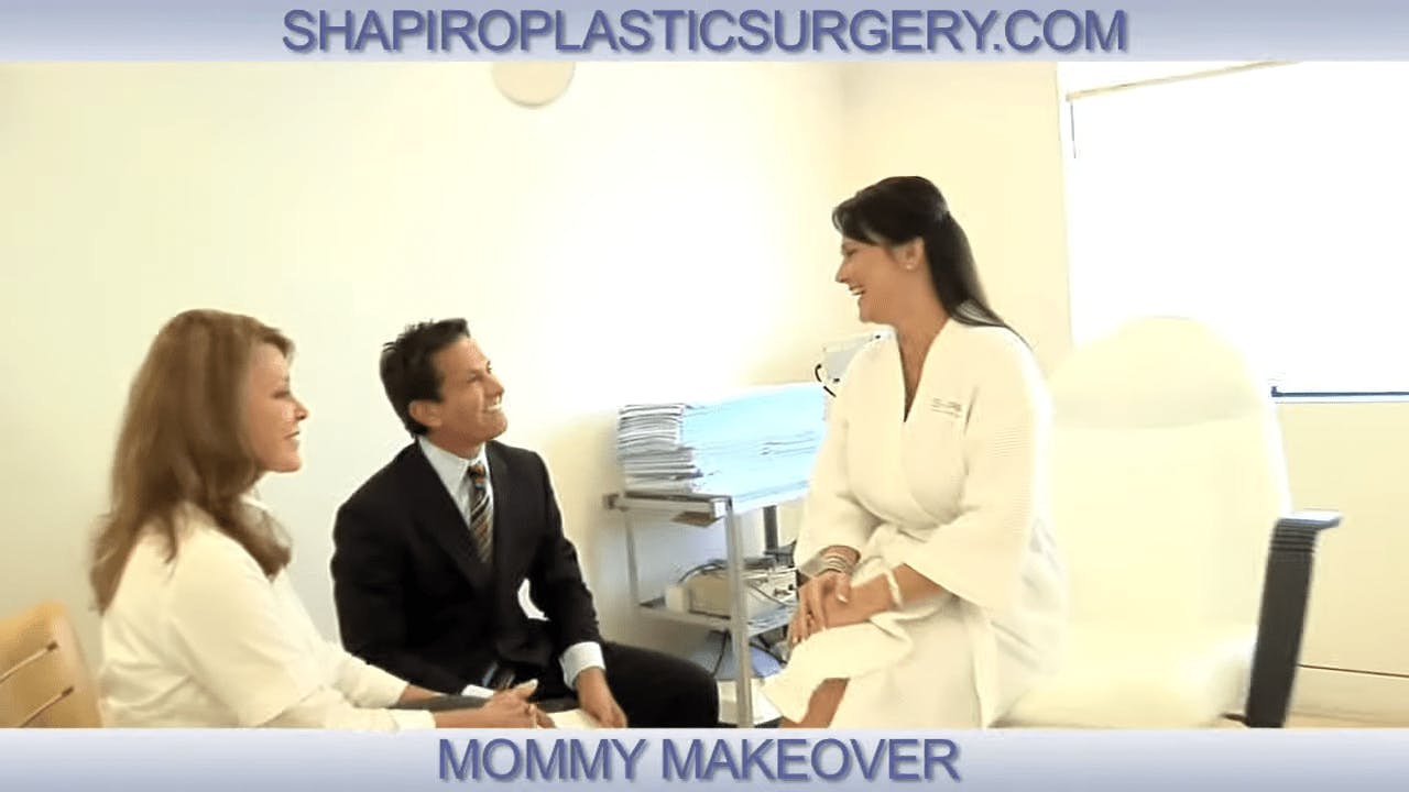 Dr. Shapiro Sitting with a Patient