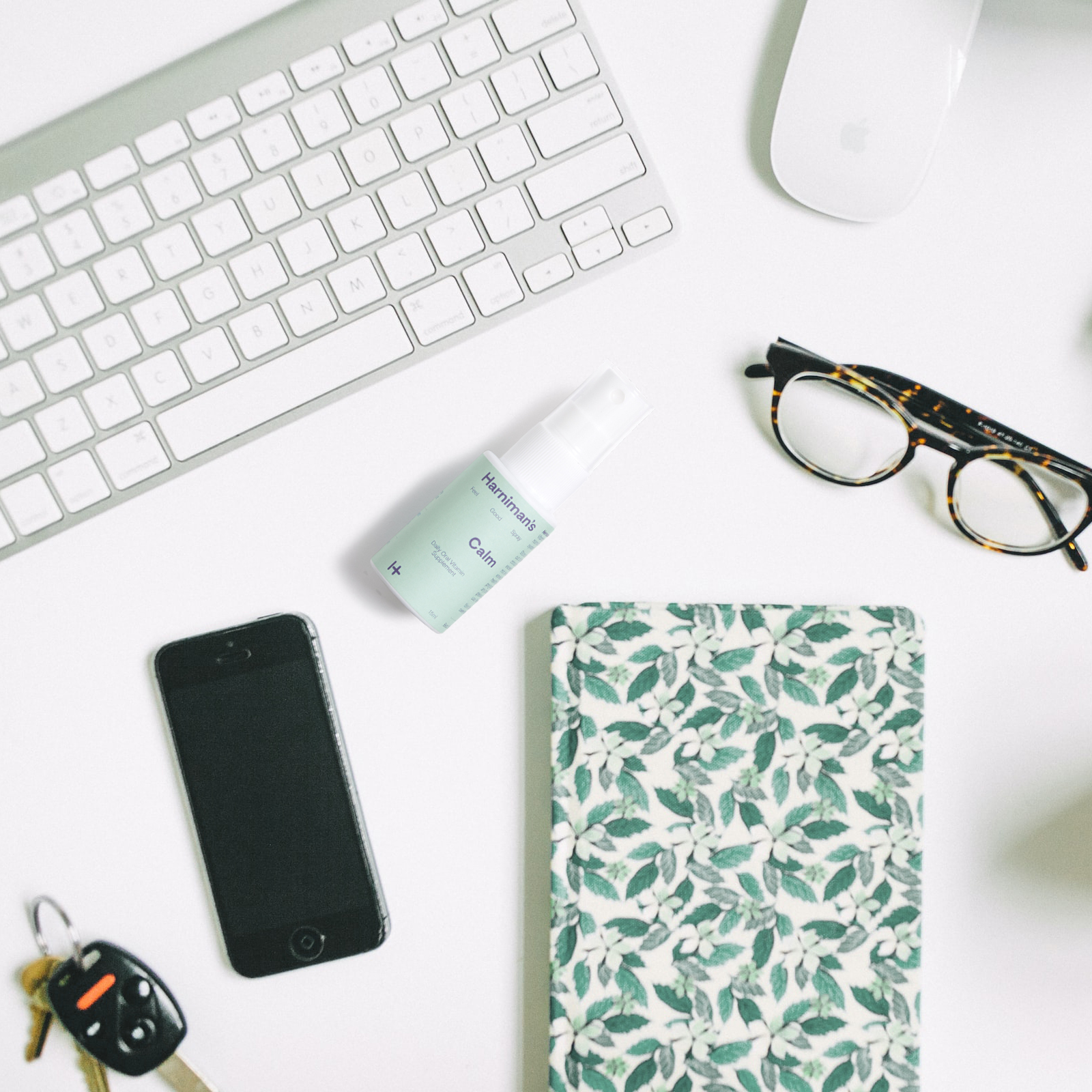 Harniman's Calm next to Notebook on Desk