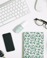 Harniman's Calm next to Notebook on Desk