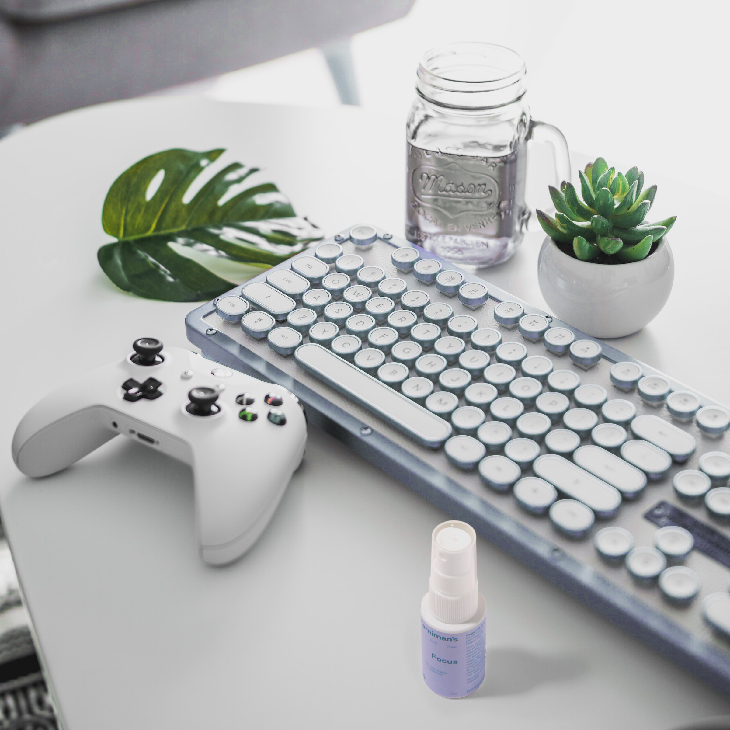 Harniman's Focus Next to Tech on a Desk