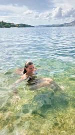 Girl smiling swimming in the sea