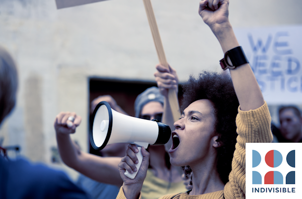 Person yelling into a megaphone