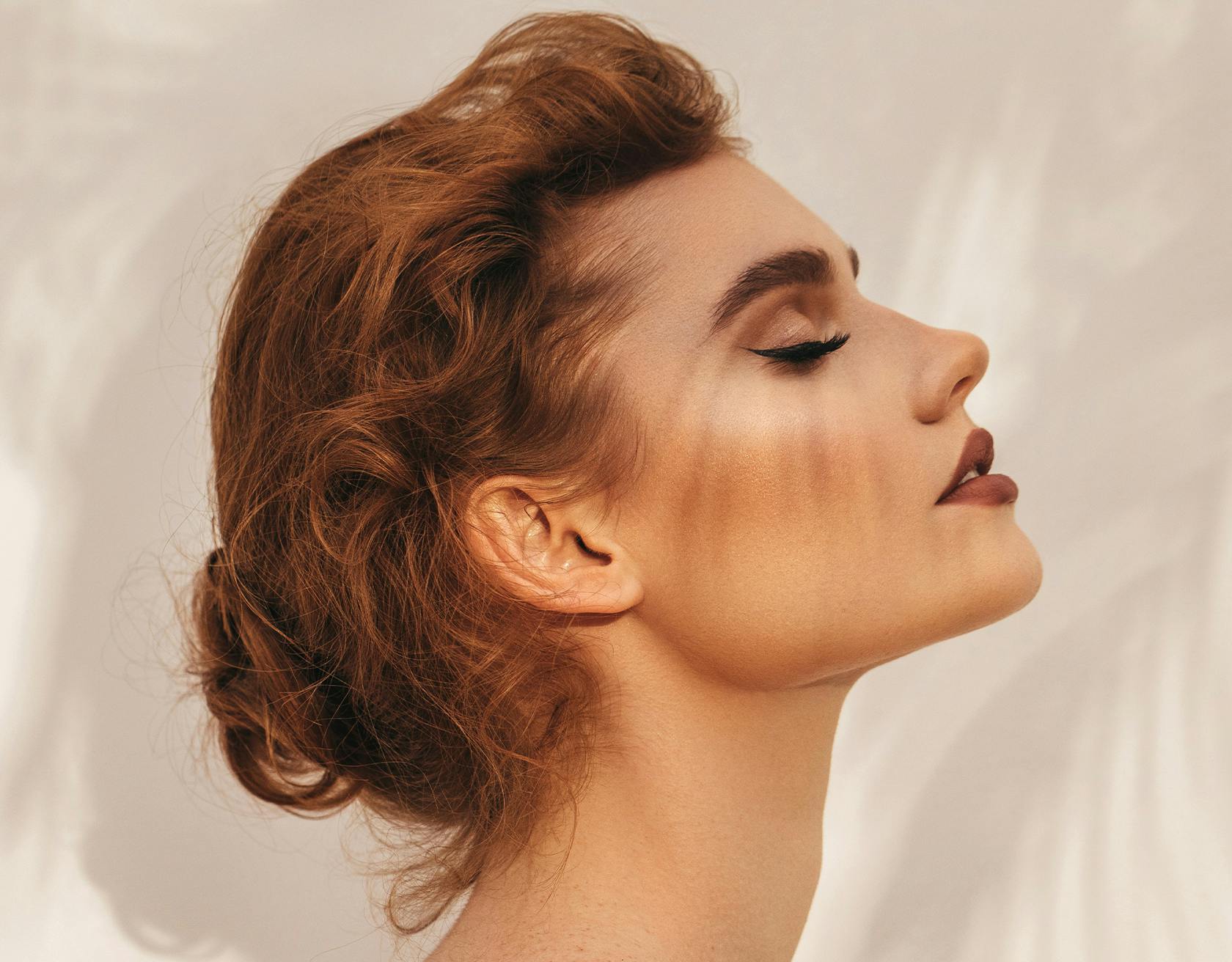 Profile of Woman with Red Hair