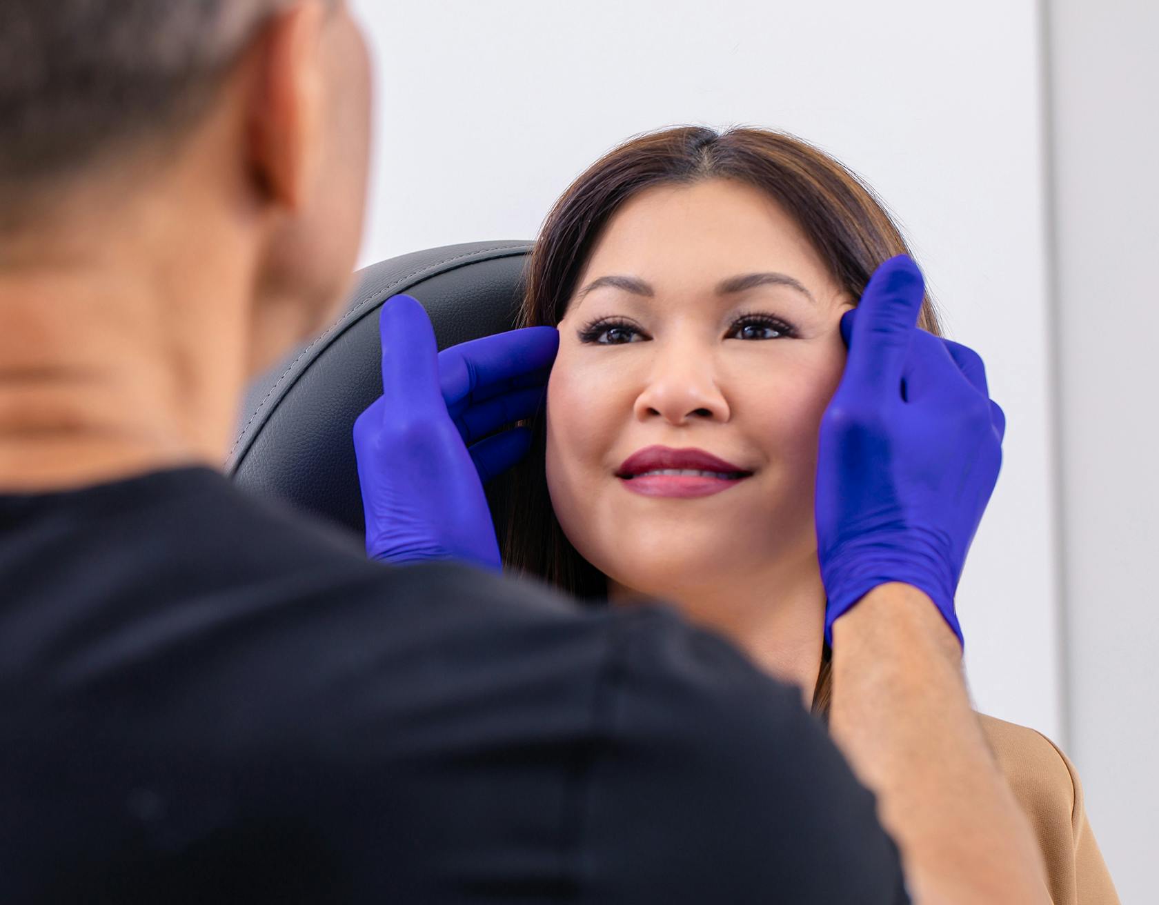 Woman's Face Getting Examined