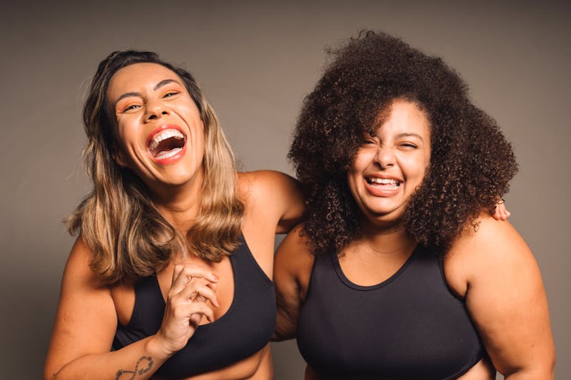 two Beautiful Women laughing