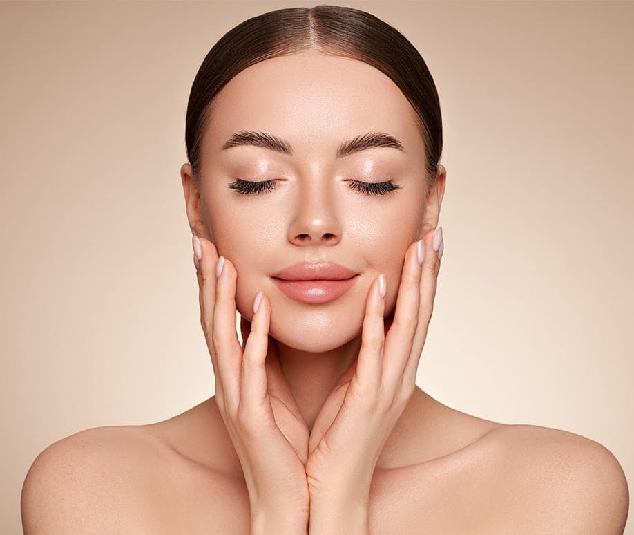 Woman touching her face