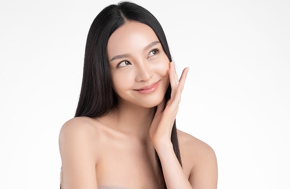 Woman with Clear Skin and Long Black Hair