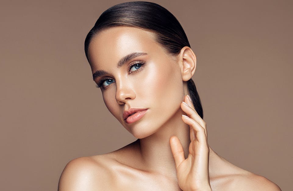 Woman Looking at the Camera with Her Head Tilted
