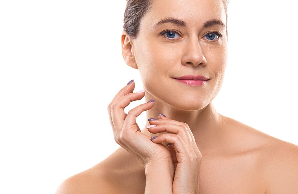 Woman with slicked Back Hair and Bare Shoulders