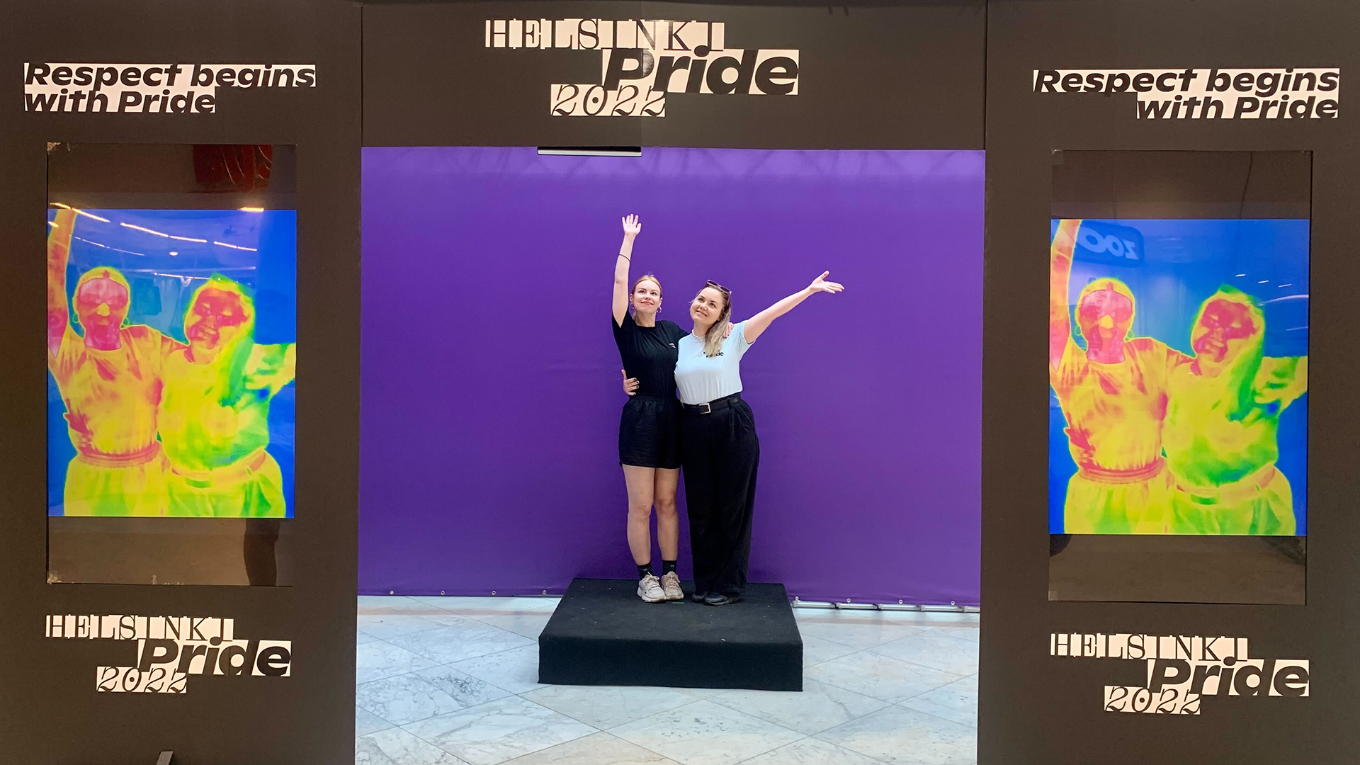 two girls in front of the thermal camera