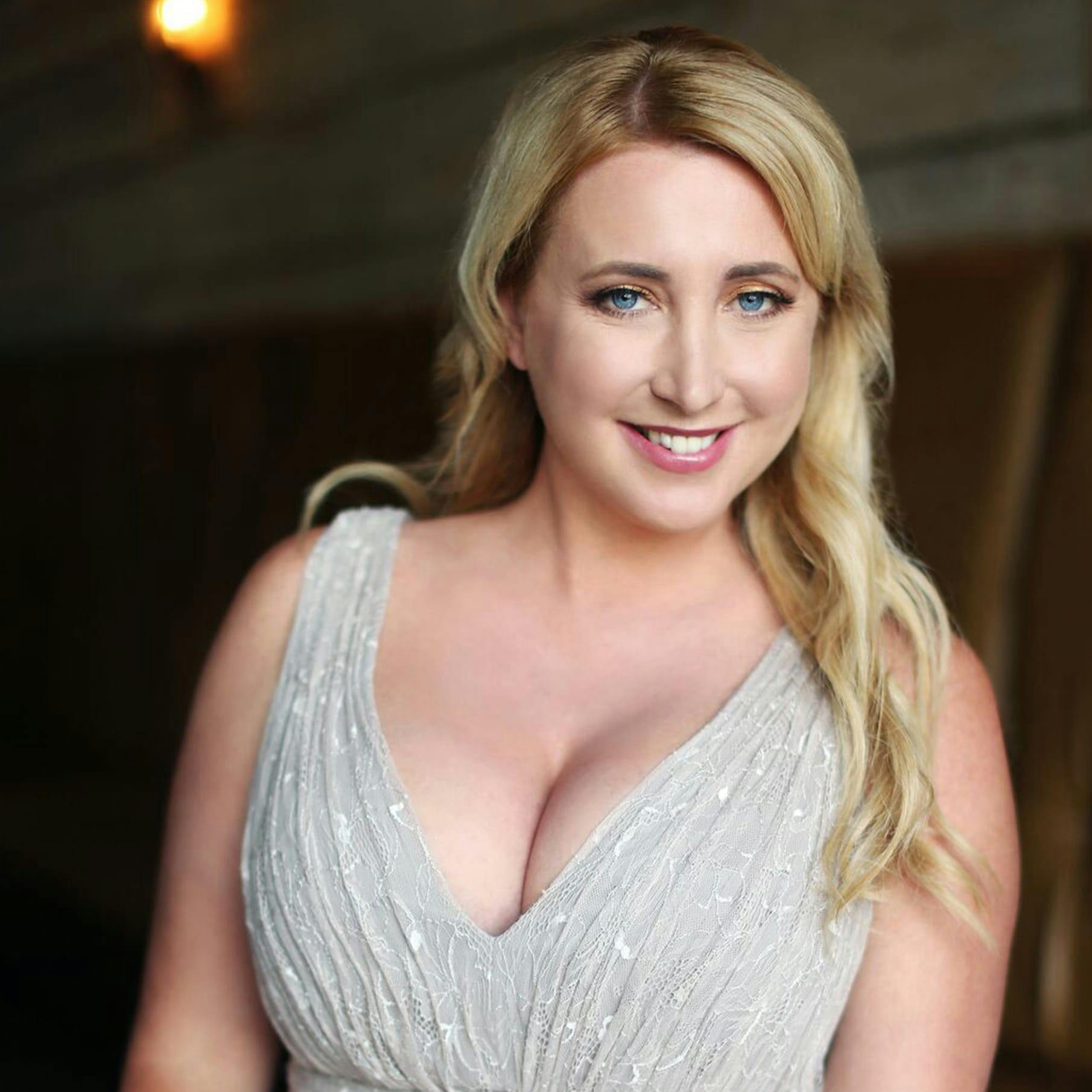 Woman in Dress with Large Breasts